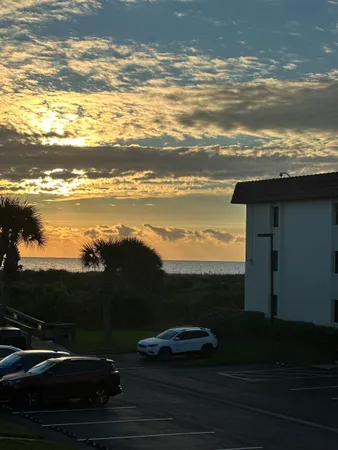 a bedroom with a bed and a table