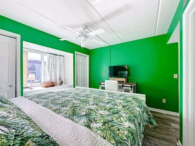 a bedroom with a bed and a table