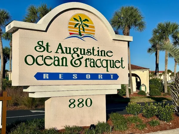 an aerial view of a house with outdoor space
