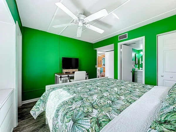 a view of a chairs and table in a patio