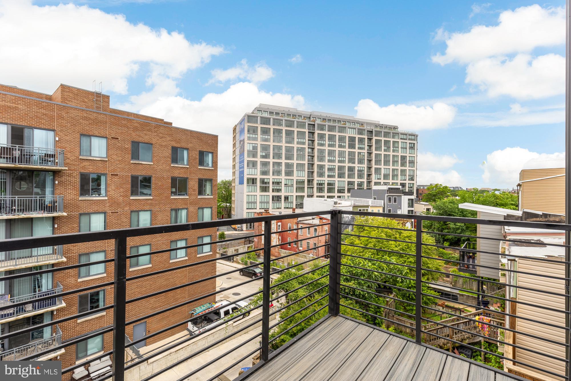 41 Q Street Northeast, Unit 2 Washington, DC 20002 - Photo 22 of 27 a view of building from balcony