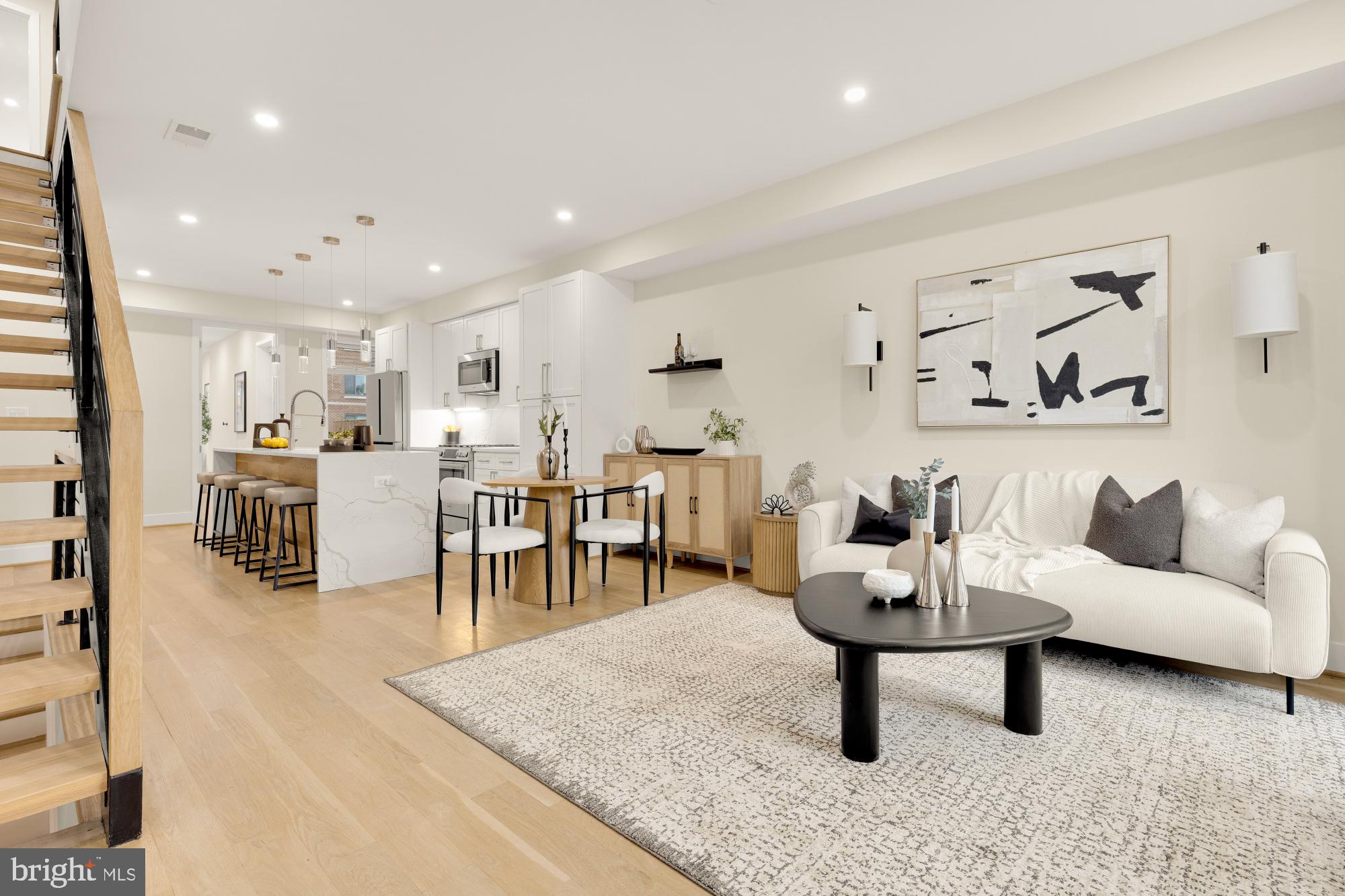 41 Q Street Northeast, Unit 2 Washington, DC 20002 - Photo 9 of 27 a living room with furniture and a table