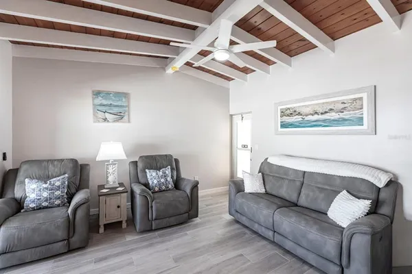 a living room with furniture and a couch