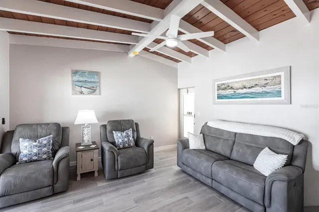 a living room with furniture and a couch