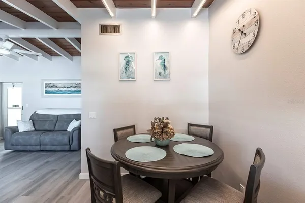 a view of a dining room with furniture