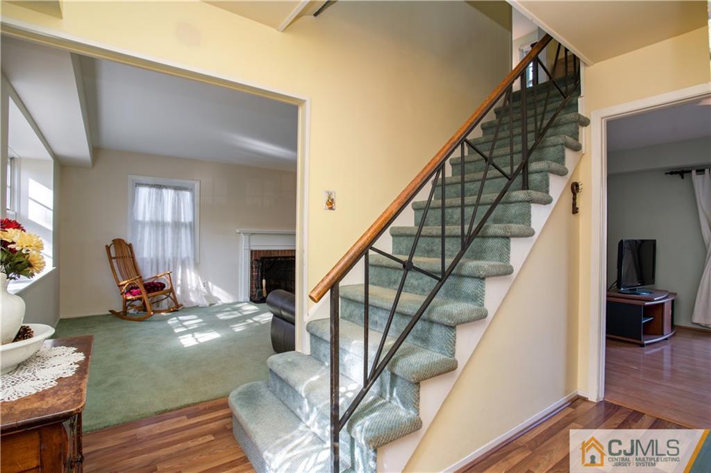 29 Abbott Road Somerset, NJ 08873 - Photo 2 of 10 a view of entryway and hall with wooden floor