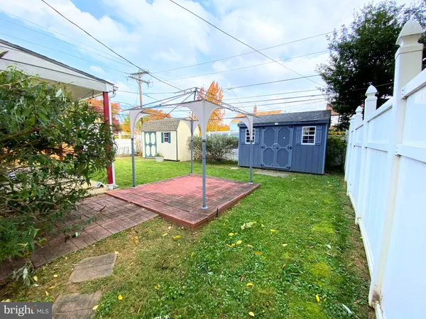 a view of a backyard with a patio