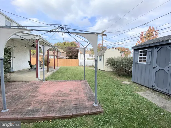 a view of a backyard with a garden
