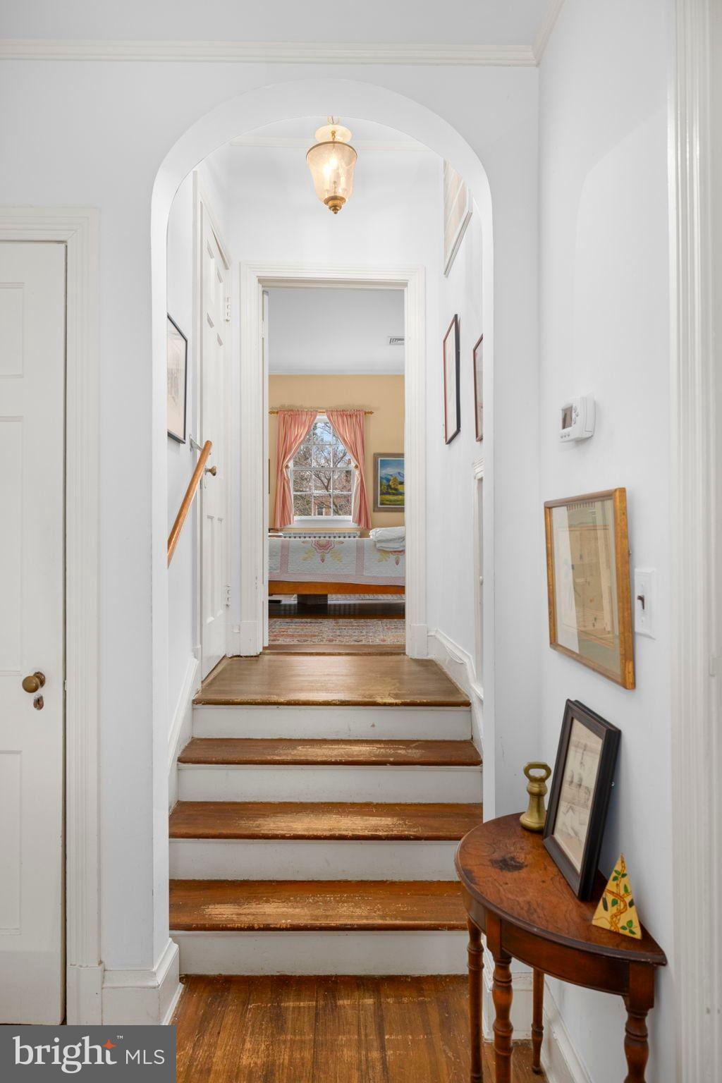 1554 34th Street Northwest Washington, DC 20007 - Photo 9 of 15 a view of entryway and hall with wooden floor
