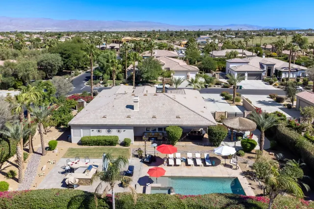 a living room with fireplace furniture and a flat screen tv