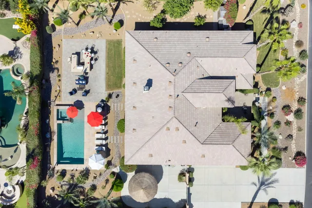 a living room with furniture fireplace and flat screen tv