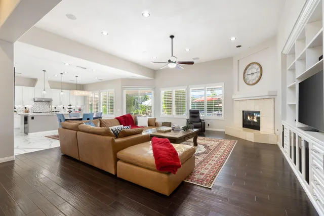 a kitchen with a sink stove and white cabinets