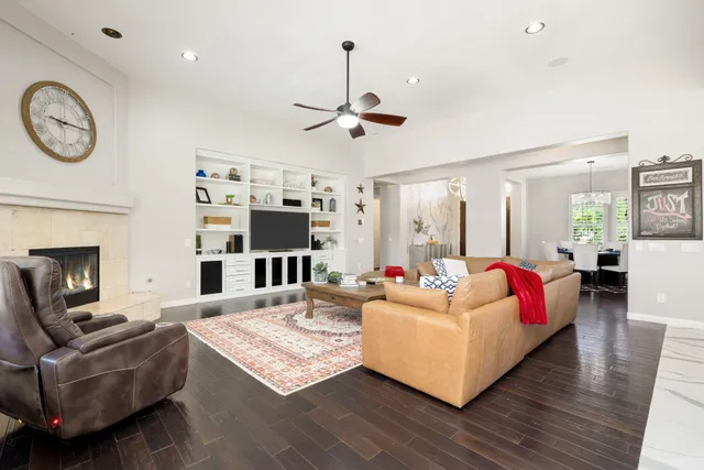 a view of an outdoor dining space with a table and chairs