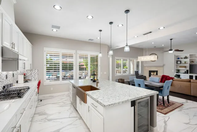 a view of a swimming pool with a patio