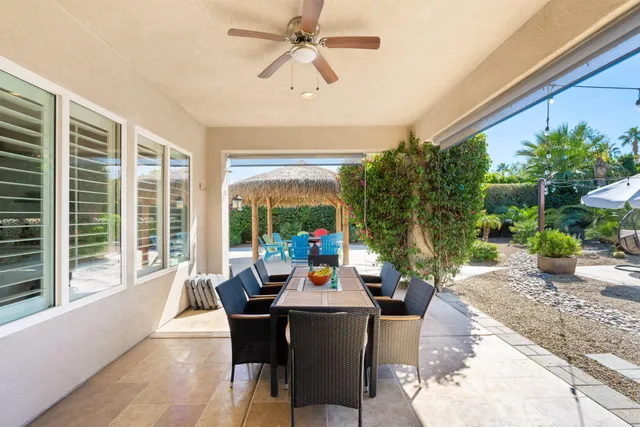 a bathroom with bathtub and window