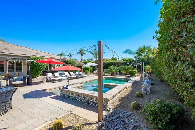 a bathroom with a sink toilet and mirror
