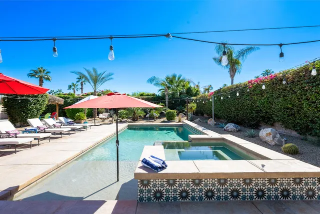a kitchen with a sink and a stove