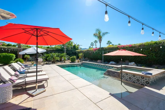 a kitchen with sink and cabinets