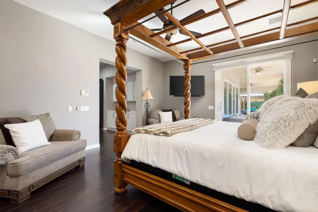 a view of a swimming pool with sitting area