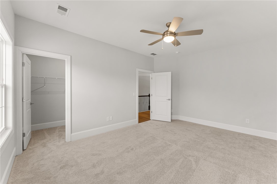 141 Rickys Path Easley, SC 29642 - Photo 28 of 40 Bright and airy, this room offers ample space and comfort for restful living.