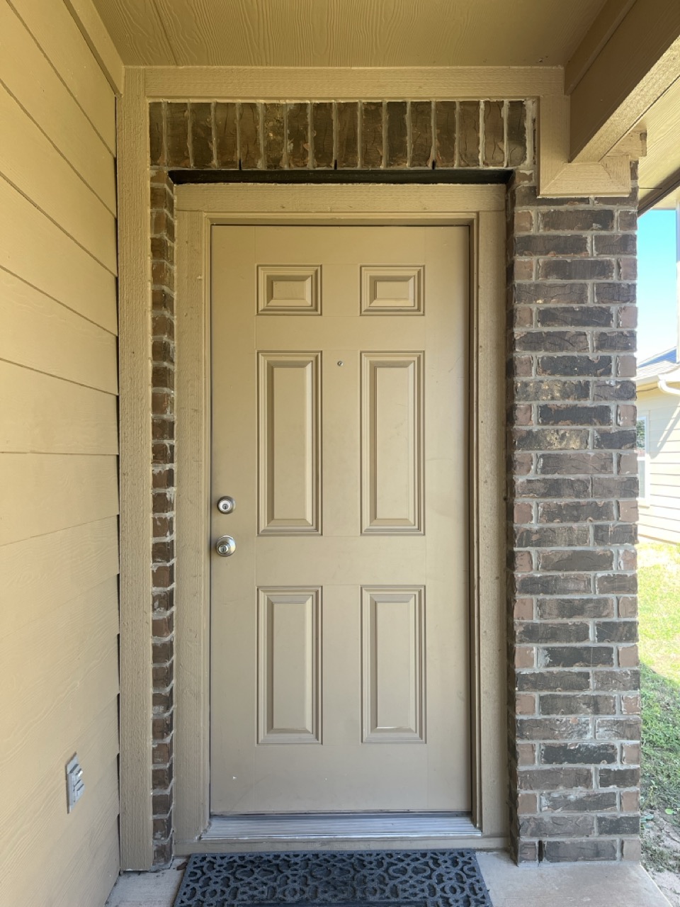 3510 Wickham Lane Austin, TX 78725 - Photo 3 of 16 View of exterior entry featuring brick siding