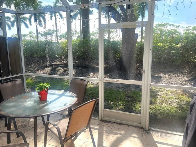 a outdoor dining space with furniture