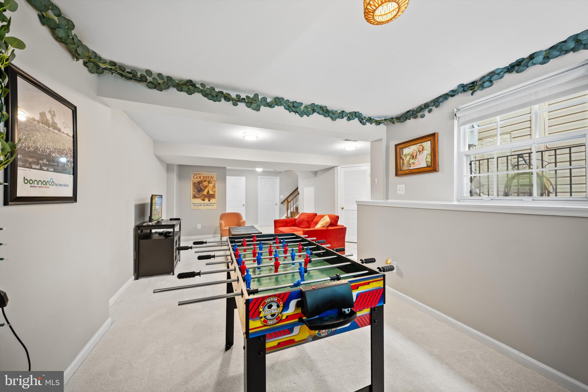 12794 Silvia Loop Woodbridge, VA 22192 - Photo 21 of 24 a living room with furniture a flat screen tv and a table