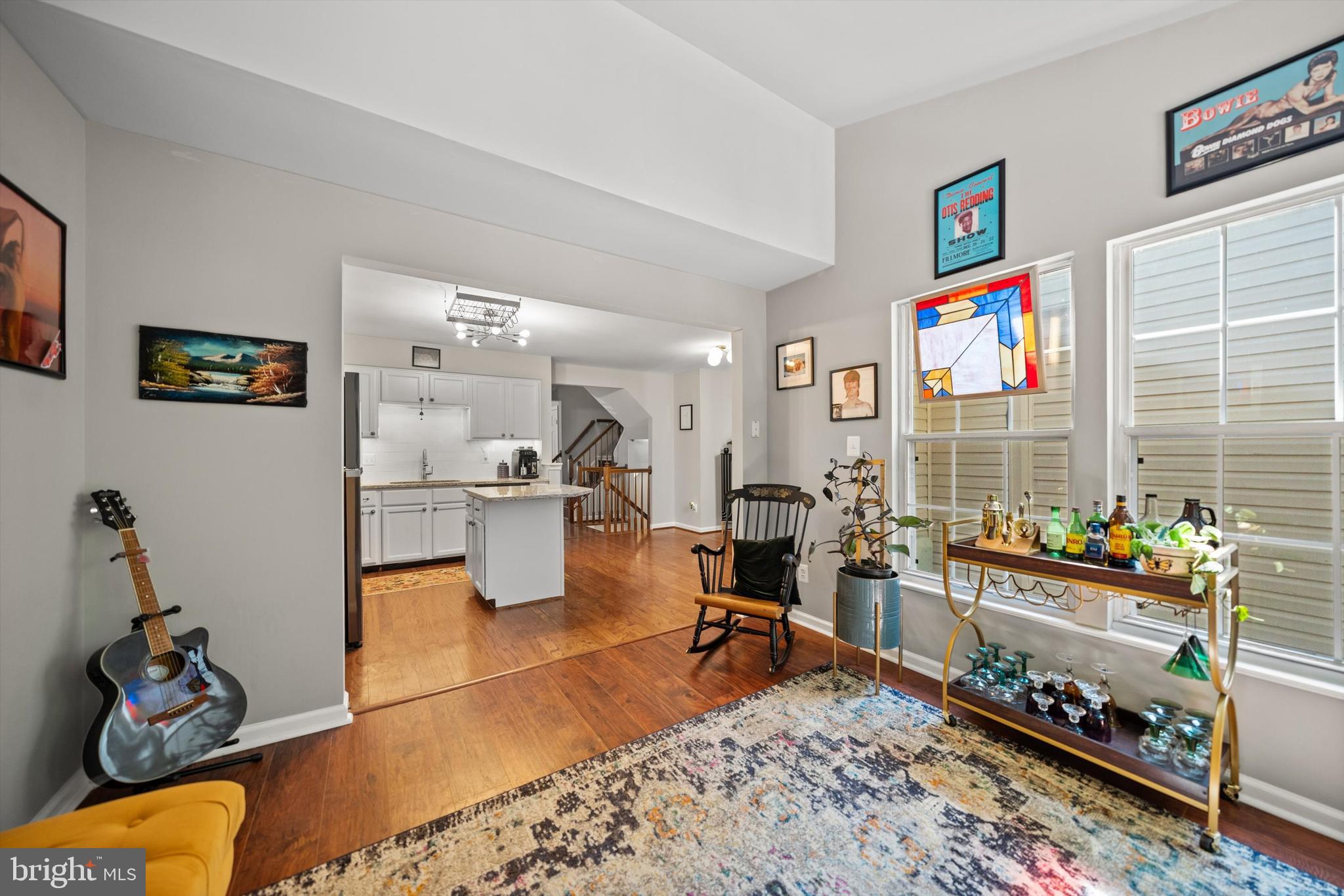 12794 Silvia Loop Woodbridge, VA 22192 - Photo 5 of 24 a living room with furniture rug and window