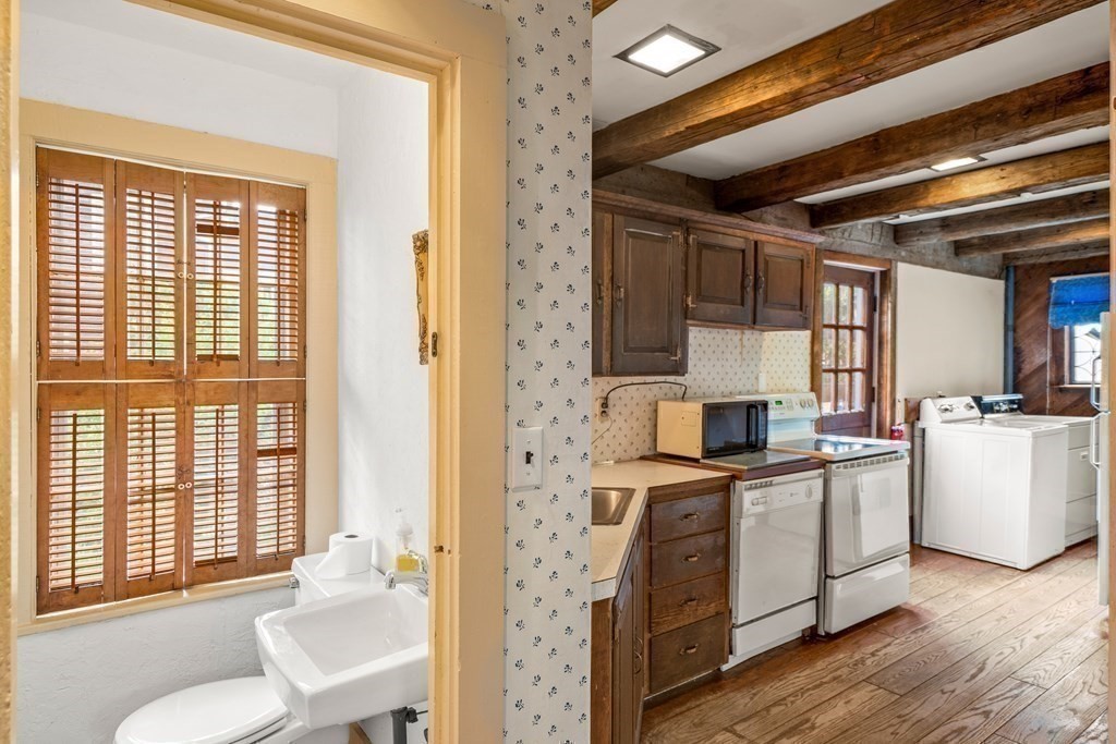 1 Red Frank Lane Marblehead, MA 01945 - Photo 17 of 32 a kitchen with a sink cabinets and wooden floor