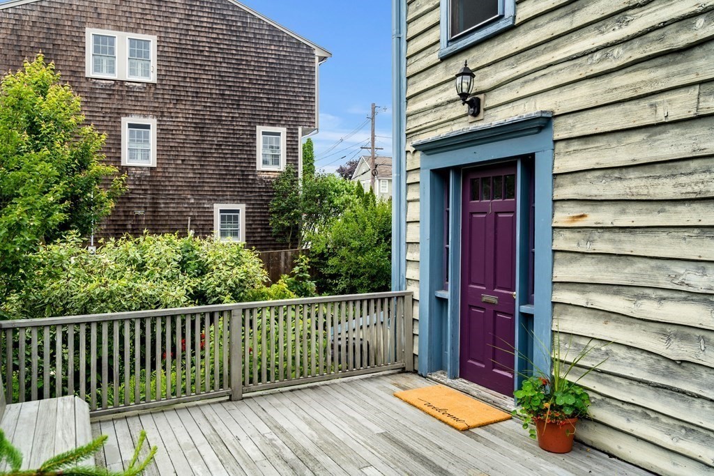 1 Red Frank Lane Marblehead, MA 01945 - Photo 3 of 32 a view of a house with a wooden fence