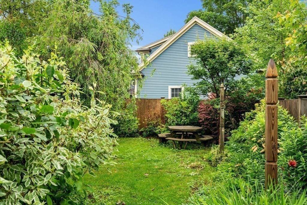 1 Red Frank Lane Marblehead, MA 01945 - Photo 7 of 32 a view of a backyard with plants and a garden