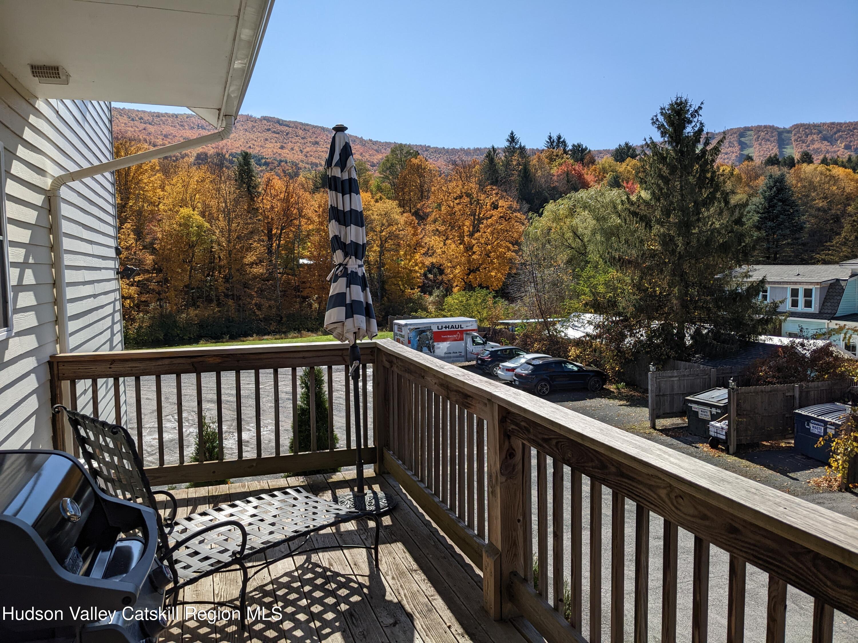 5359 Main Street, Unit 2H Windham, NY 12496 - Photo 2 of 22 a view of a balcony with an outdoor space