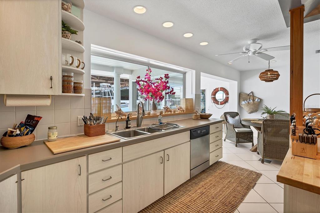 161 Damficare Street Boca Grande, FL 33921 - Photo 13 of 51 a kitchen with lots of counter top space