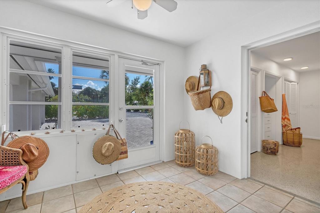 161 Damficare Street Boca Grande, FL 33921 - Photo 36 of 51 a view of a kitchen area with furniture and windows