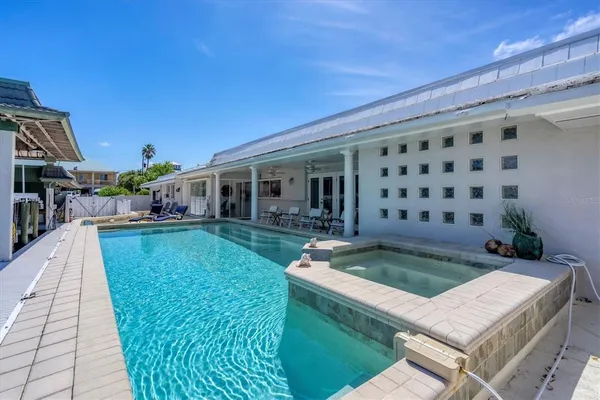 a view of a house with swimming pool