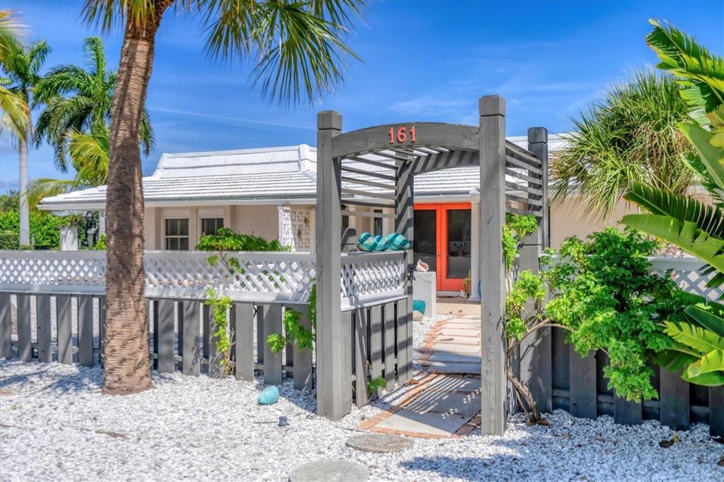161 Damficare Street Boca Grande, FL 33921 - Photo 6 of 51 a front view of house with yard