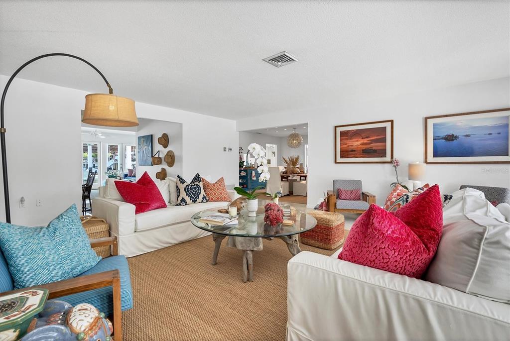 161 Damficare Street Boca Grande, FL 33921 - Photo 9 of 51 a living room with furniture and wooden floor