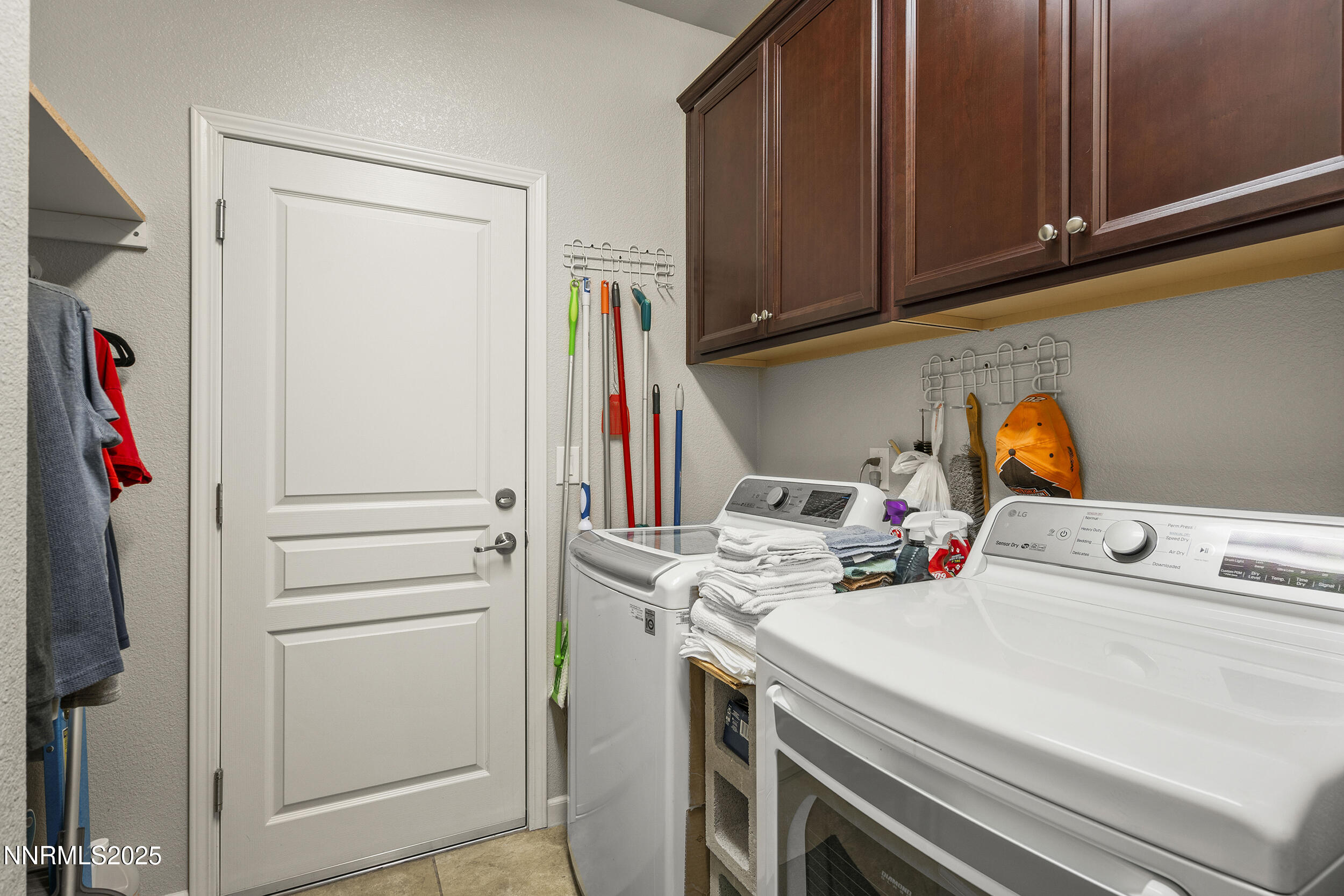 9165 Kenton Trail Reno, NV 89523 - Photo 21 of 22 a storage room with washer and dryer
