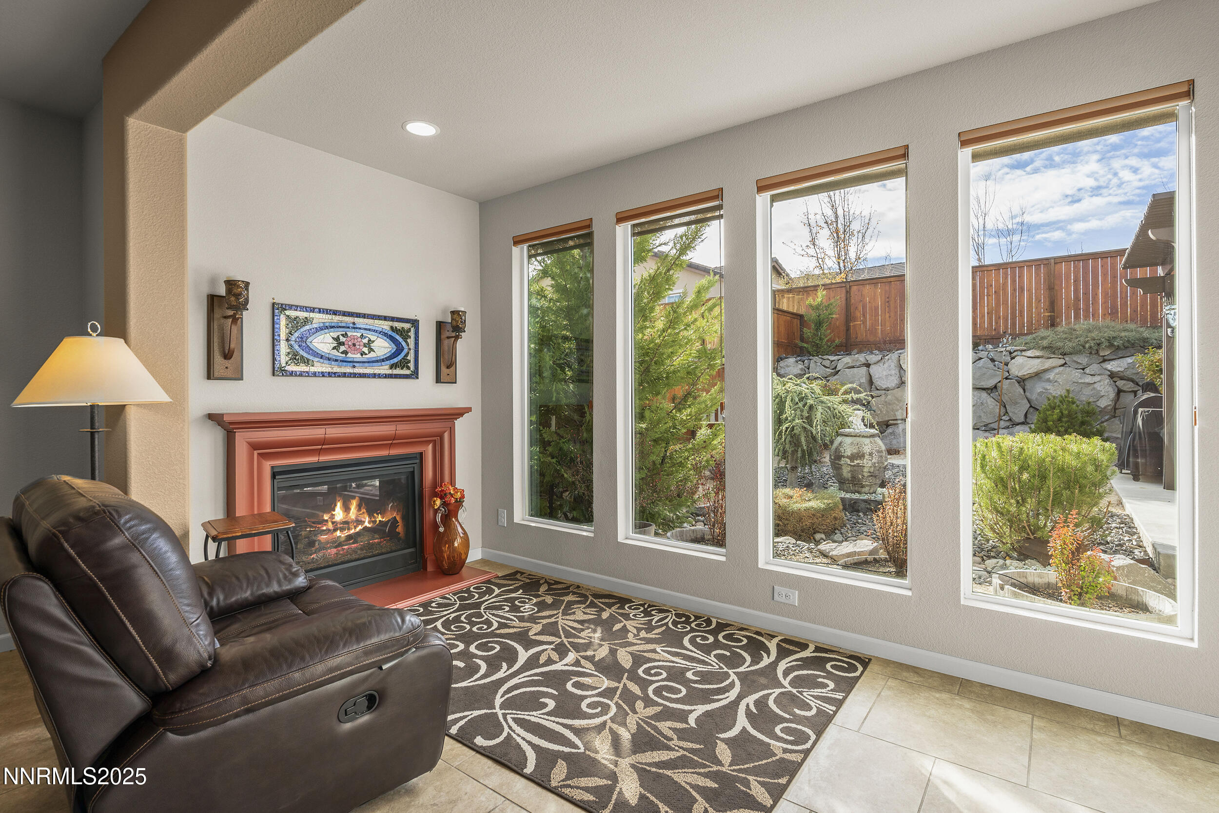9165 Kenton Trail Reno, NV 89523 - Photo 5 of 22 a living room with furniture and a fireplace