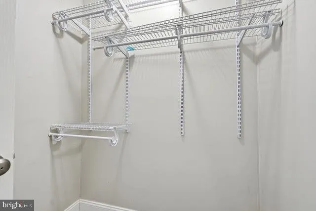 a view of a room with racks on the wall