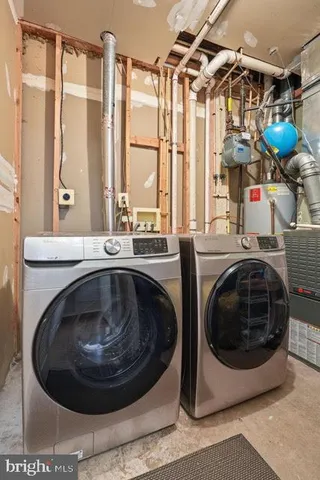 a utility room with a washer and dryer