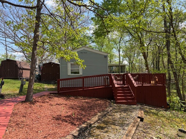 2795 East 28th Road Marseilles, IL 61341 - Photo 1 of 56 a view of a house with backyard and a tree