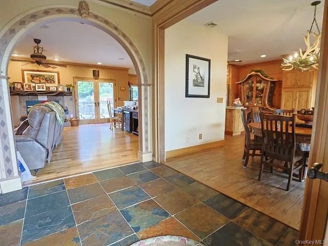 a view of a livingroom with furniture and a dinning table