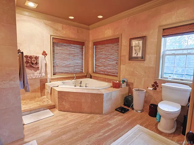 a view of a bathroom with a sink and a mirror