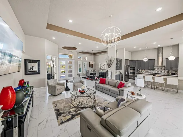 a kitchen with counter top space appliances and cabinets