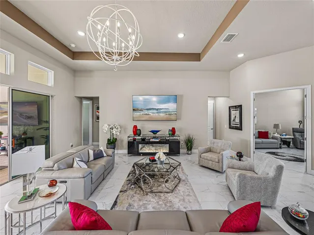 a kitchen with stainless steel appliances kitchen island granite countertop a sink and cabinets
