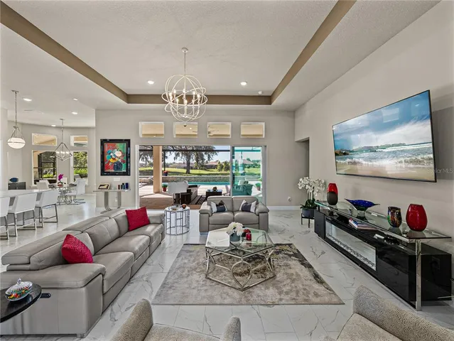 a kitchen with stainless steel appliances a sink stove and cabinets