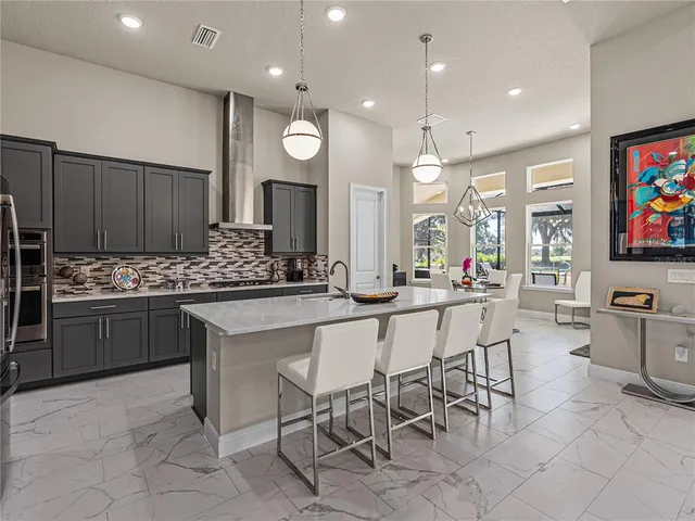 a living room with lots of furniture and gym equipment
