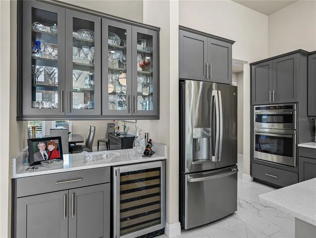 a spacious bedroom with a bed and a couch