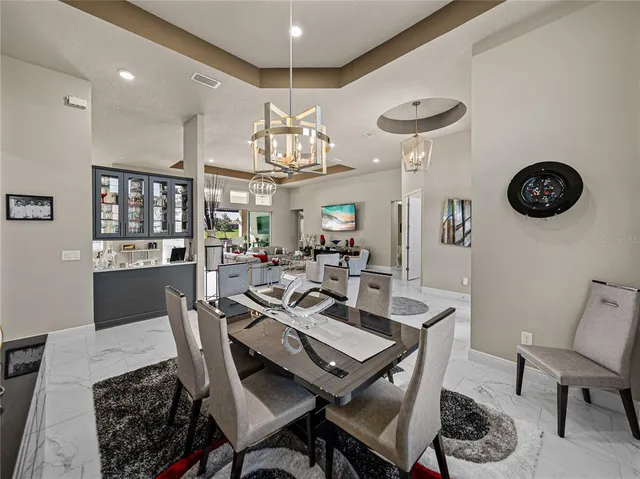 a bathroom with a double vanity sink toilet and shower